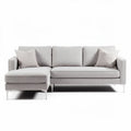 Modern sectional sofa in light gray fabric with two accent pillows 220 x 90 x 85cm